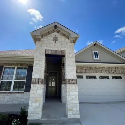 Rent this 4 bed house on 2228 Tumbleweed Hill Cv in Leander, Texas