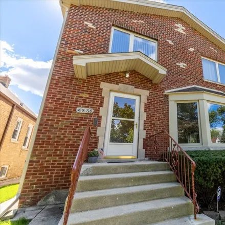 Buy this 4 bed house on Beat 2511 in 6975 West Fletcher Street, Chicago