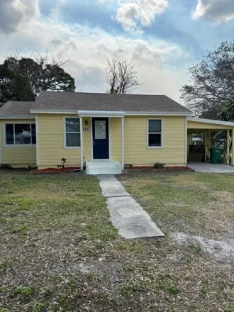 Rent this 2 bed house on 2999 Summit Street in Fort Pierce, FL 34982