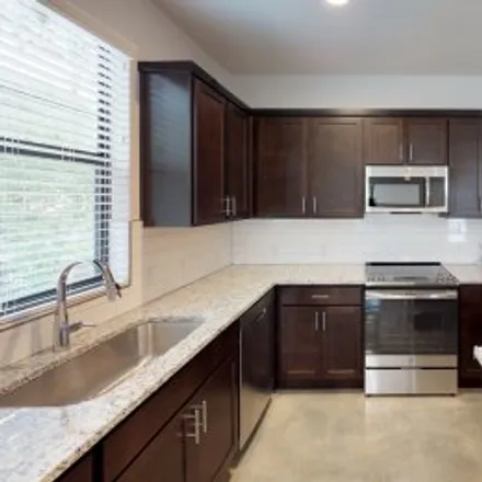 Rent this 2 bed apartment on #100,200 Melrose Place in Arlington Heights, San Antonio