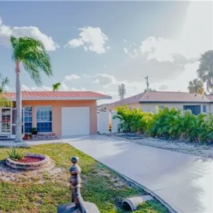 Rent this 4 bed house on 1446 Southeast 43rd Terrace in Cape Coral, FL 33904