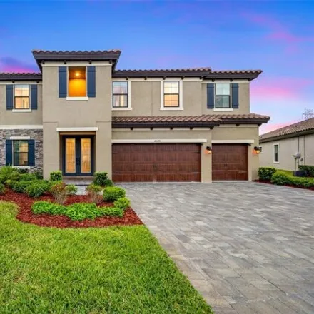 Buy this 5 bed house on Woods Rider Loop in Starkey Ranch, FL 34656