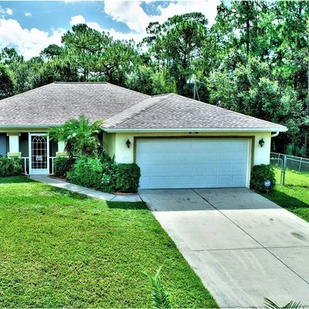 Buy this 3 bed house on 1222 Lee Avenue in Lehigh Acres, FL 33972