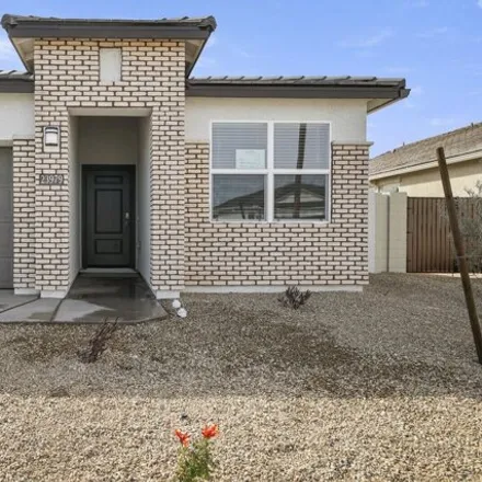 Buy this 4 bed house on 1815 South 239th Drive in Buckeye, AZ 85326