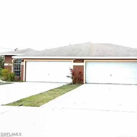 Rent this 2 bed house on 332 Homer Avenue South in Lehigh Acres, FL 33973