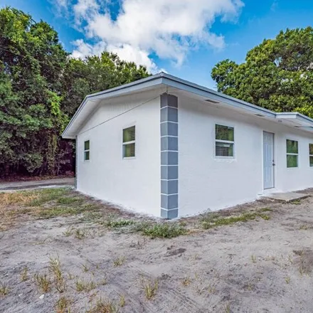 Image 1 - Un Road, Gifford, FL 34960, USA - House for rent