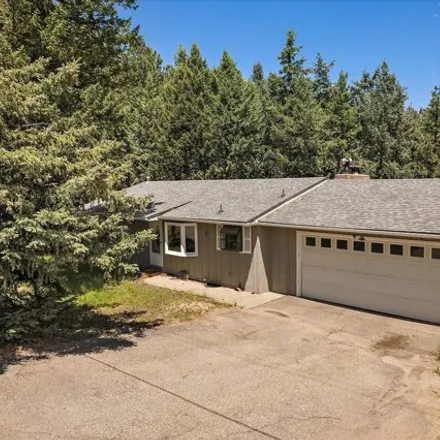 Buy this 4 bed house on 30595 Isenberg Lane in Evergreen, CO 80439