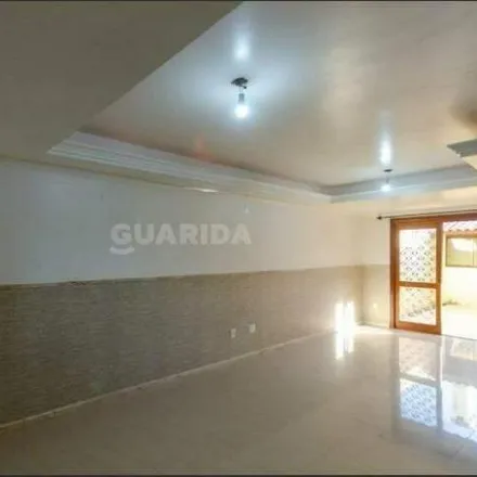 Rent this 3 bed house on unnamed road in Guarujá, Porto Alegre - RS