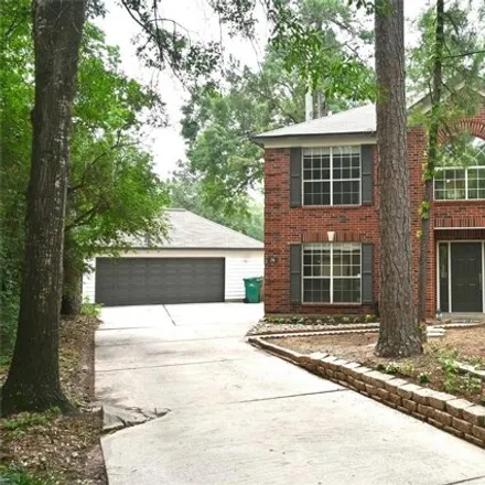Rent this 4 bed house on 98 Trestletree Place in The Woodlands, TX 77380