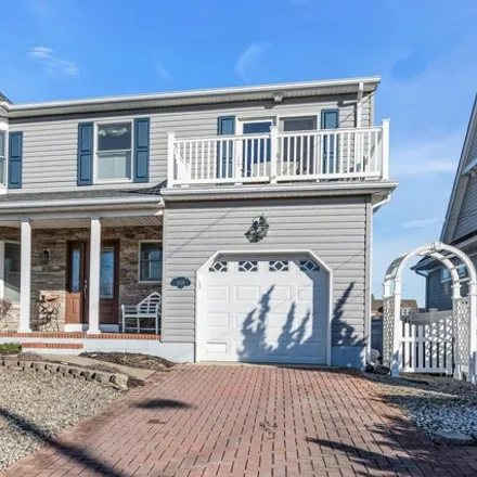 Buy this 4 bed house on 2103 Seagull Terrace in Point Pleasant, NJ 08742