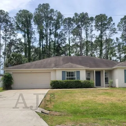 Rent this 3 bed house on 64 Pin Oak Drive in Palm Coast, FL 32164