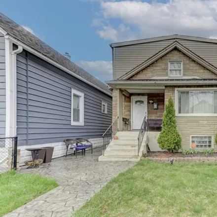 Buy this 4 bed house on 7136 South Washtenaw Avenue in Chicago, IL 60629