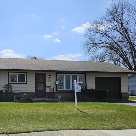 Buy this 4 bed house on 621 Oakton Street in Elk Grove Village, IL 60007