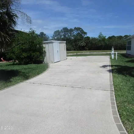 Buy this studio house on 354 Plantation Drive in Brevard County, FL 32780