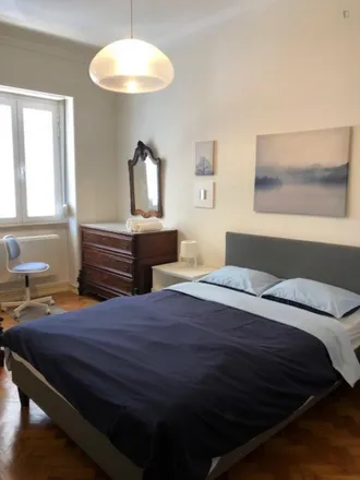 Rent this 3 bed room on Rua Doutor Figueiredo in 1500-112 Lisbon, Portugal