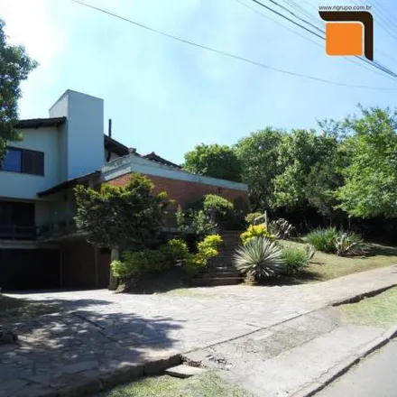 Buy this 5 bed house on Rua Izalino Bitencourt de Oliveira in Oriçó, Gravataí - RS