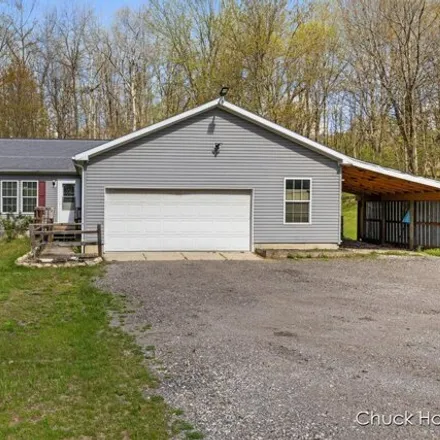 Image 3 - 16221 Wildwood Valley Drive, Solon Township, MI 49319, USA - House for sale