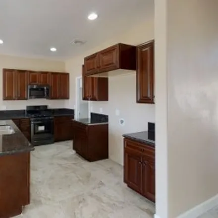Buy this 4 bed apartment on 4938 South Mesa Verde Drive