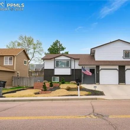 Buy this 5 bed house on Zimmer Medical Building in 5715 Kittery Drive, El Paso County