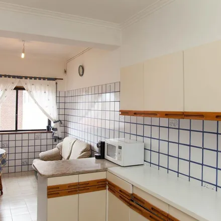 Rent this 4 bed apartment on Rua Carlos Seixas 107 in 3030-177 Coimbra, Portugal