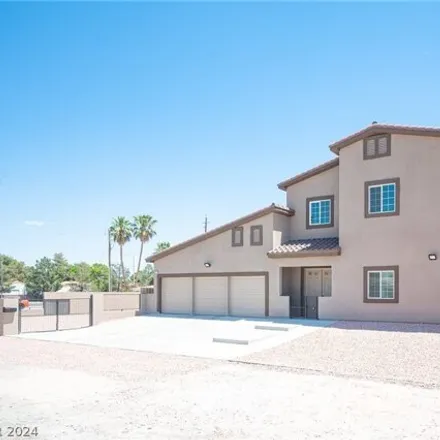 Buy this 6 bed house on 2364 North Michael Way in Las Vegas, NV 89108