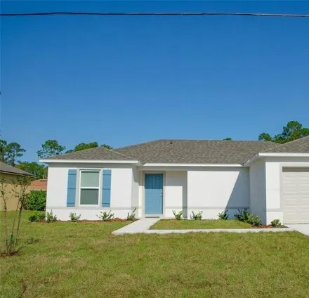 Rent this 3 bed house on 31 Ryley Ln in Palm Coast, Florida