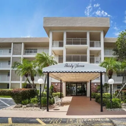 Rent this 2 bed condo on Palms Course in 3701 Oaks Clubhouse Drive, Pompano Beach