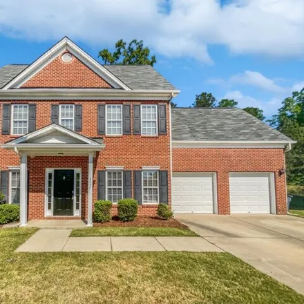 Buy this 6 bed house on 898 Pyracantha Drive in Holly Springs, NC 27540