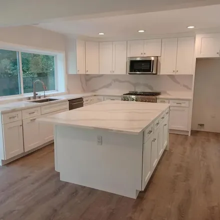 Rent this 6 bed apartment on 4634 Poe Avenue in Los Angeles, CA 91364