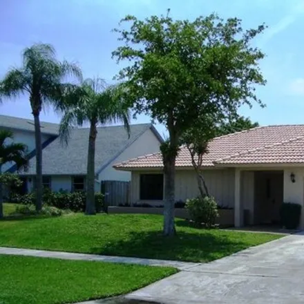 Rent this 4 bed house on 6156 Amberwoods Drive in Palm Beach County, FL 33433