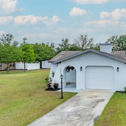Buy this 2 bed house on 2541 Waterfall Drive in Spring Hill, FL 34608