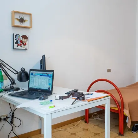 Rent this 3 bed room on Via Giambellino Via Tolstoj in Via Giambellino, 20146 Milan MI