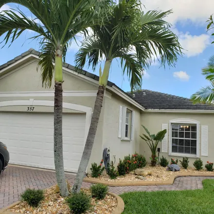 Rent this 3 bed house on 364 Southwest Coconut Key Way in Port Saint Lucie, FL 34986