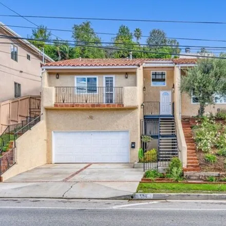Rent this 4 bed house on 234 North Kenter Avenue in Los Angeles, CA 90049
