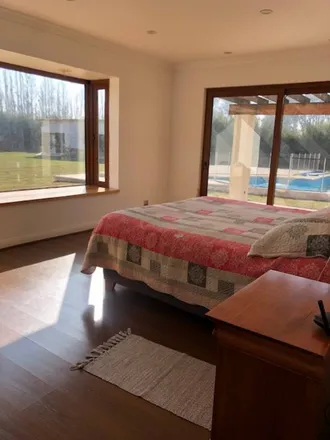 Buy this 6 bed house on El Condominio in 794 0068 Peñalolén, Chile