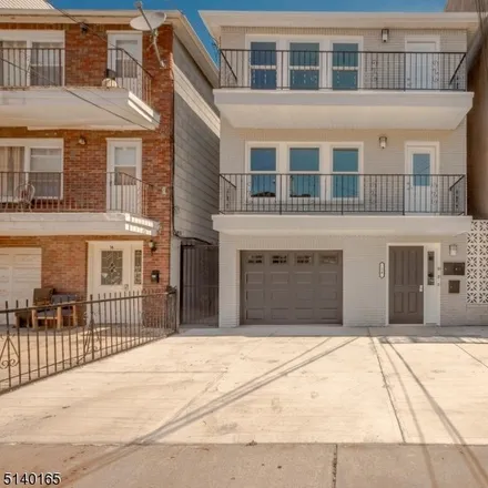 Buy this 8 bed townhouse on 14 Poplar Street in Jersey City, NJ 07307