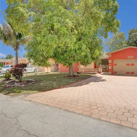 Rent this 3 bed house on 7150 Coral Boulevard