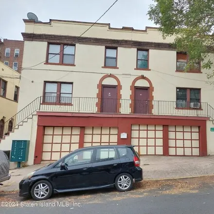 Buy this 12 bed house on 28 Monroe Avenue in New York, NY 10301