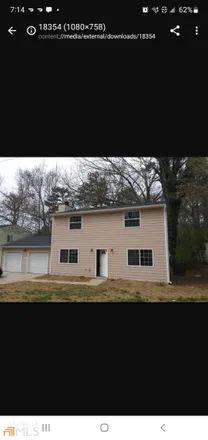 Rent this 4 bed house on 1261 Muirfield Drive in Redan, GA 30088