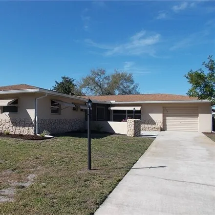 Buy this 4 bed house on 111 West Lake Drive in Lehigh Acres, FL 33936