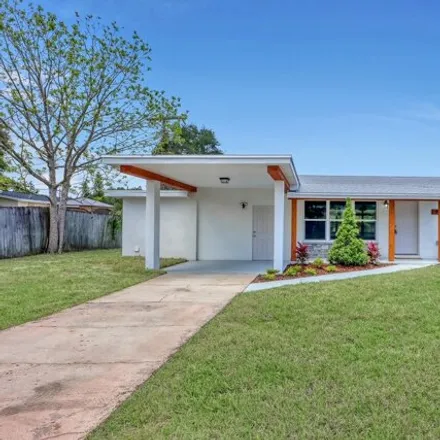 Buy this 3 bed house on 1951 Golfview Drive in Whispering Hills Golf Estates, Titusville