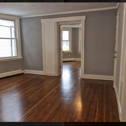 Rent this 4 bed townhouse on 18 Baldwin Avenue in Newark, NJ 07108