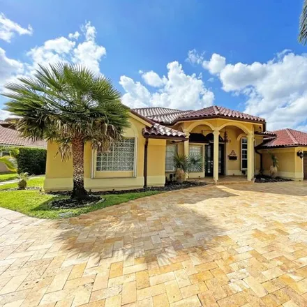 Rent this 5 bed house on 10605 Maple Chase Drive in Palm Beach County, FL 33498