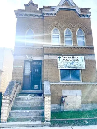 Buy this 4 bed house on Mount Hope Baptist Church in 6026 South Princeton Avenue, Chicago
