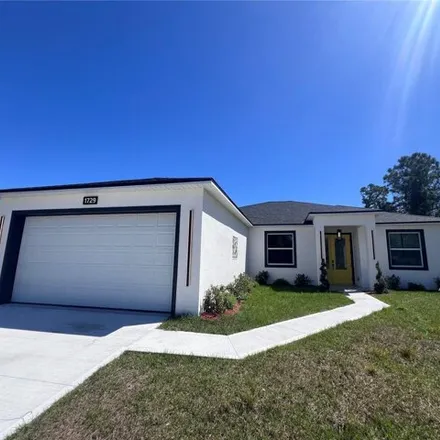 Buy this 4 bed house on 1733 Gould Avenue Southwest in Palm Bay, FL 32908