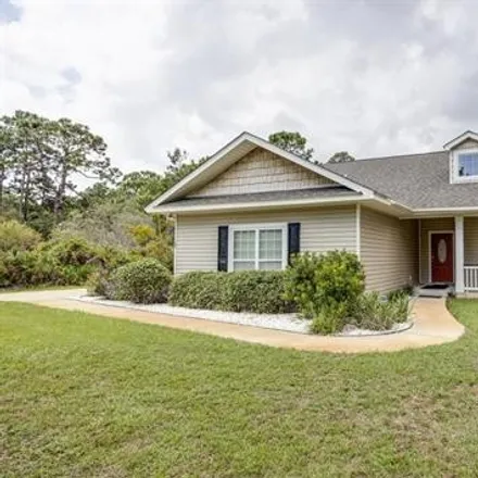 Buy this 3 bed house on 100 Shadow Bay Drive in Franklin County, FL 32328