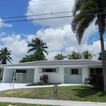 Buy this 4 bed house on 4247 Northwest 10th Street in Coconut Creek Park, Coconut Creek