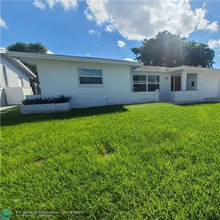 Buy this 2 bed house on 7412 Northwest 58th Court in Tamarac, FL 33321