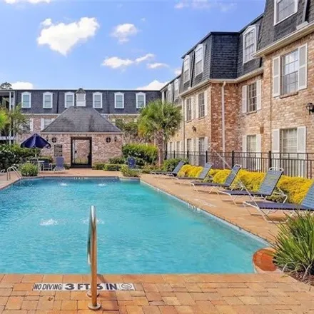 Buy this 2 bed condo on 357 North Post Oak Lane in Houston, TX 77024