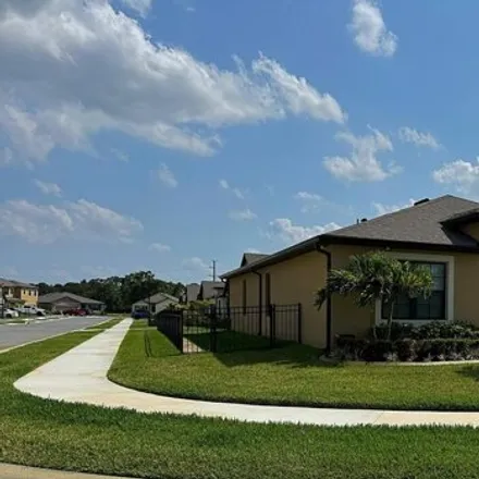 Buy this 4 bed house on Mineral Loop Drive Northwest in Palm Bay, FL 32908